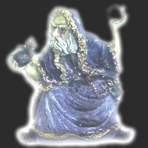   Wizard in Blue Robe Instructing Dragon Hatchling 