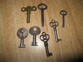 lot of 7 skeleton keys one might be for a clock  