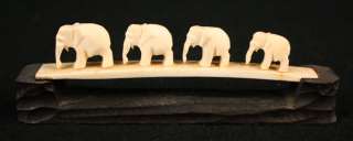   CARVED BOVINE COW BONE MINIATURE FAMILY OF ELEPHANTS WITH STAND  