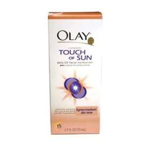  Olay Touch Of Sun UV Lotion Lighter to Medium Tones Spf 15 