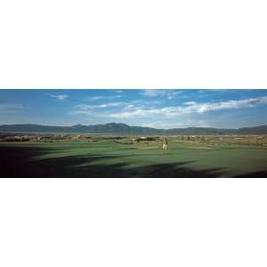 Rear View of a Man Playing Golf, Taos, New Mexico by Panoramic Images 