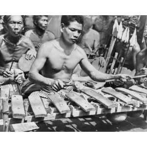  1939 photo Balinese musician playing wooden xylophone in 