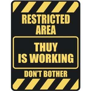   RESTRICTED AREA THUY IS WORKING  PARKING SIGN