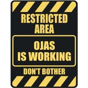   RESTRICTED AREA OJAS IS WORKING  PARKING SIGN