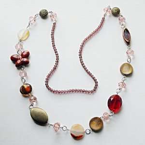   Blossoms. Necklace with pink bead, butterfly and a charming faux ruby