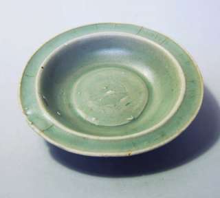 Yuan celadon dish with impressed twin fishes  