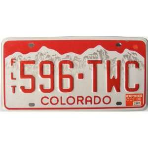  Colorado License Plate with Red Letters with White Mountain 