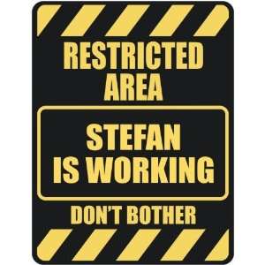   RESTRICTED AREA STEFAN IS WORKING  PARKING SIGN