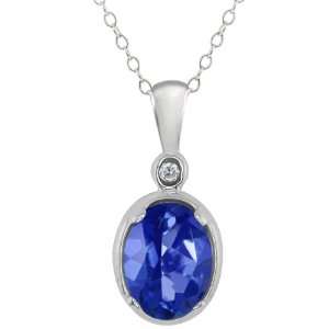  1.61 Ct Oval Sapphire Blue Mystic Topaz and Diamond 18k 