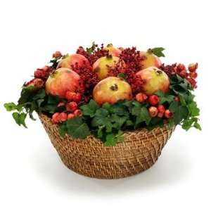  Pomegranates with berries in basket