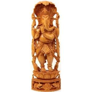  Lord Ganesha Playing Flute with Serpent Hood Over His Head 