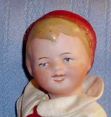 Antique German Bisque CHARACTER DOLL with Molded Hat  