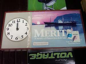 Merit clock cigarette store advertisement  