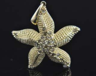   beautiful pair of starfish pendant cast from solid 14k yellow gold