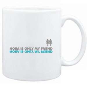  Mug White  Nora is only my friend  Female Names Sports 