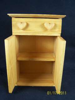   open and top drawer pulls out. The Drawer has two heart handle