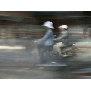Motor Bike and Cyclist, Ho Chi Minh City (Saigon), Vietnam, Southeast 