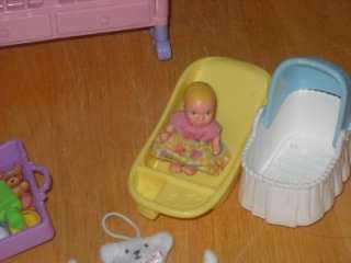 You are bidding on a Lot of Barbie Happy Family, includes the Crib 
