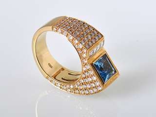 Description Ultra modern 18K yellow gold pave diamonds and topaz are 
