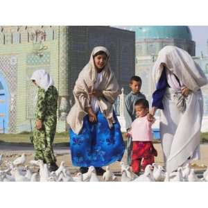  Family Looking at the Famous White Pigeons, Shrine of 